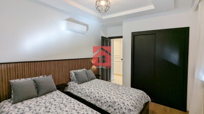 Appartement moderne avec piscine à louer